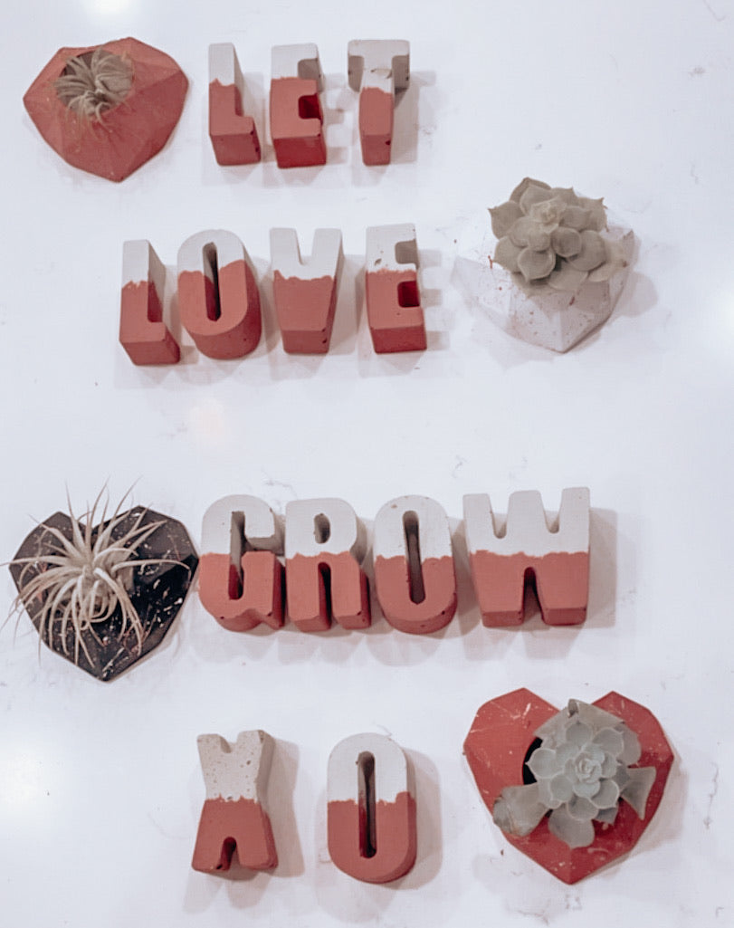 Mauve Cement Letters
